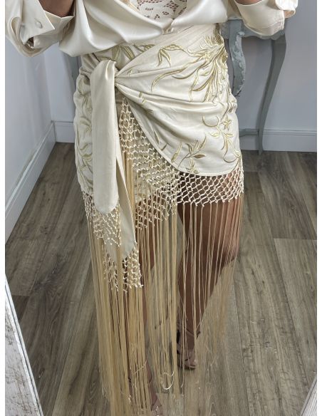 Falda pantalón beige bordados con flecos