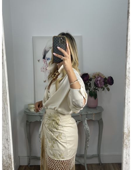 Falda pantalón beige bordados con flecos