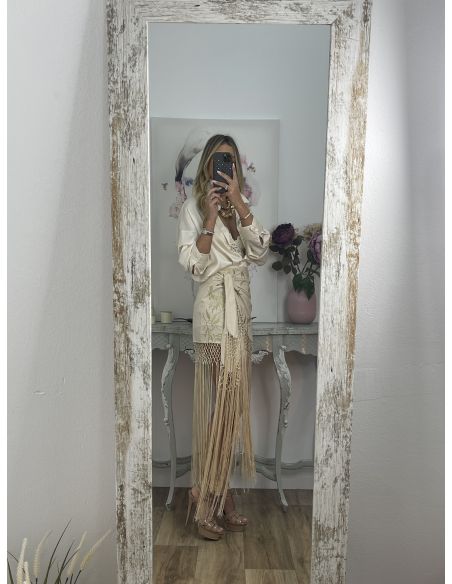 Falda pantalón beige bordados con flecos