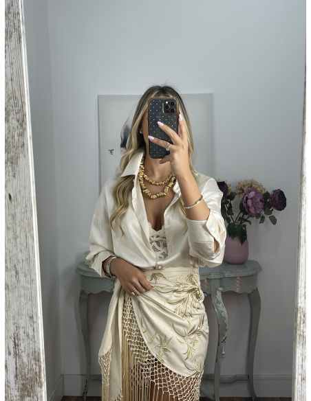 Falda pantalón beige bordados con flecos