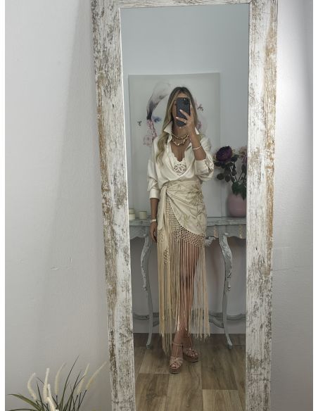 Falda pantalón beige bordados con flecos