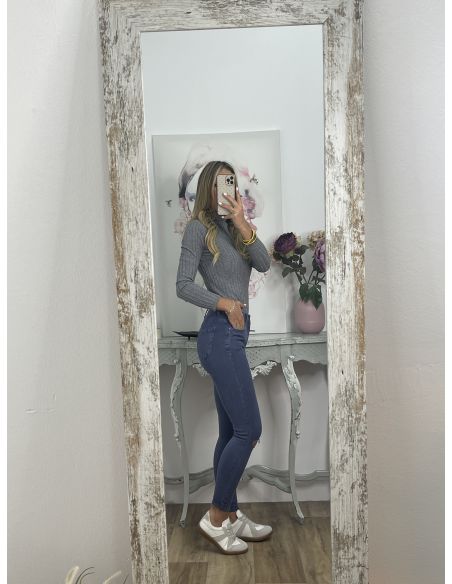 Jeans azul roto rodilla