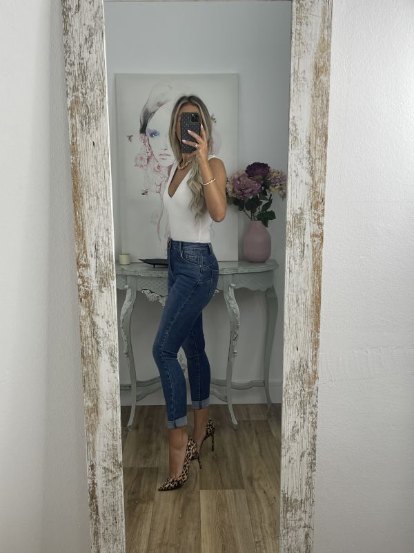 Jeans denim claro etiqueta roja