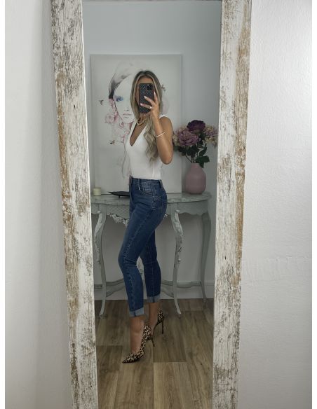 Jeans denim claro etiqueta roja