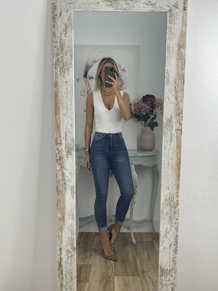 Jeans denim claro etiqueta roja