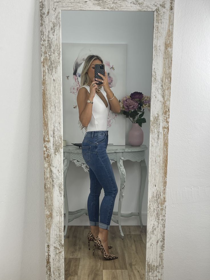 Jeans denim claro etiqueta roja