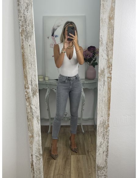 Jeans gris etiqueta roja