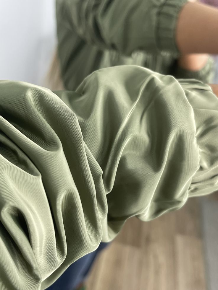 Cortavientos verde volantes