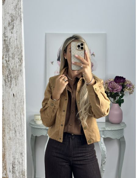 Chaqueta antelina flecos y tachas