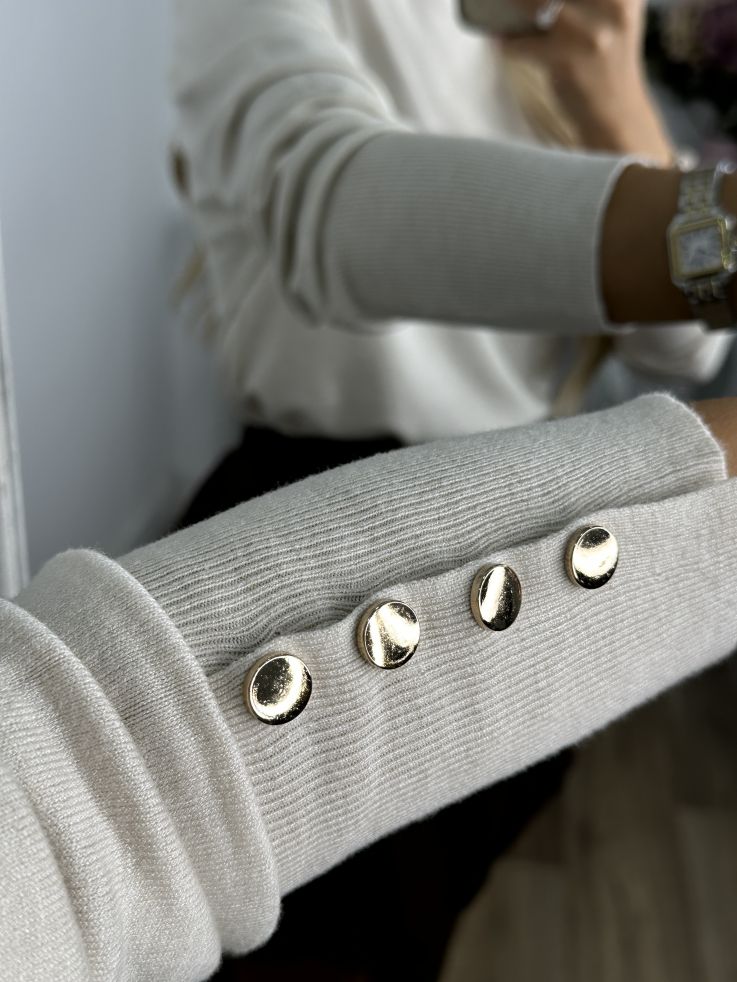 Jersey beige basic con botones dorados en el puño