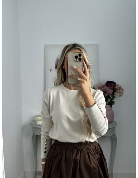 Jersey beige basic con botones dorados en el puño