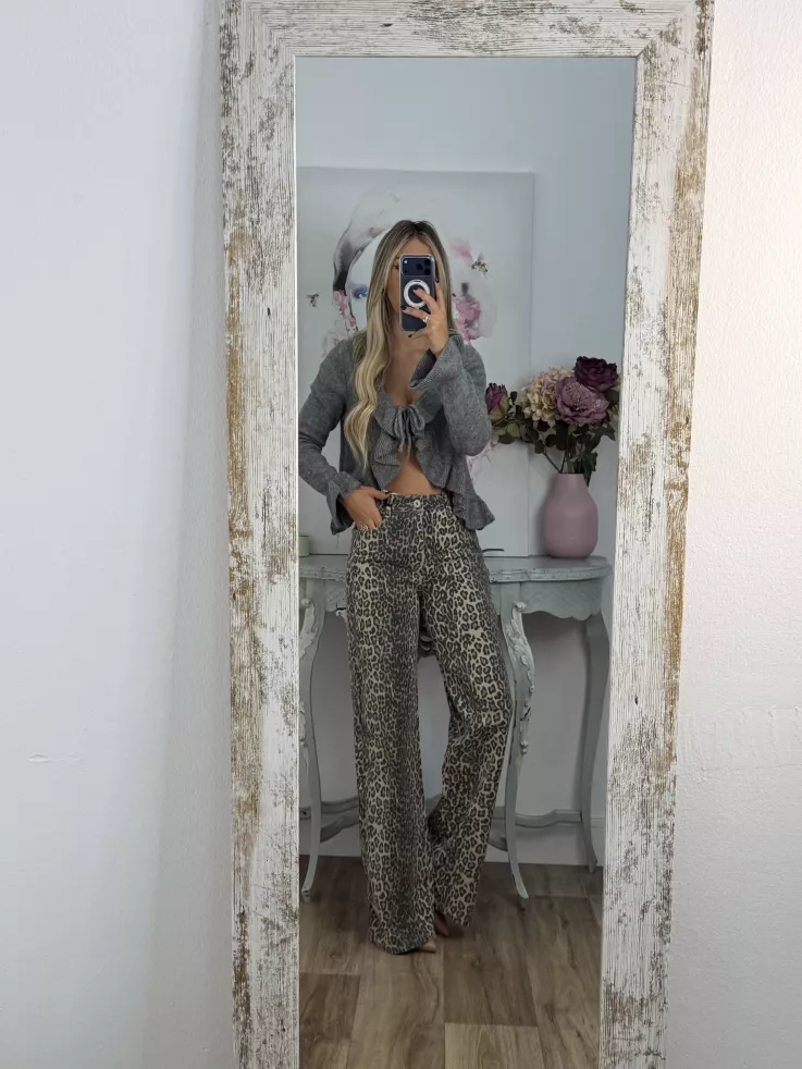 Rebeca lazada volante gris