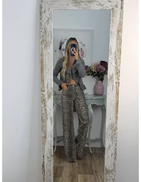 Rebeca lazada volante gris