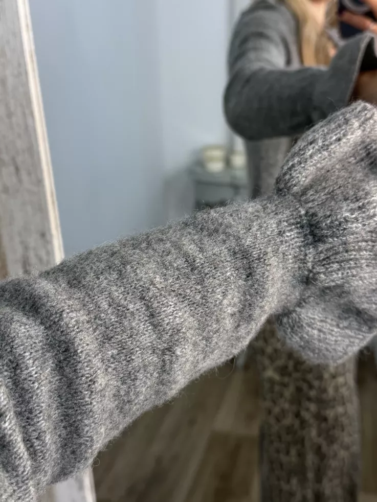 Rebeca lazada volante gris