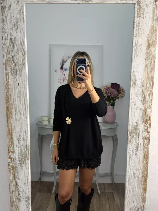 Jersey broche dorado negro