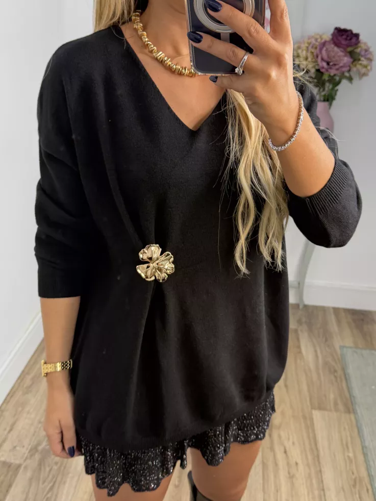 Jersey broche dorado negro