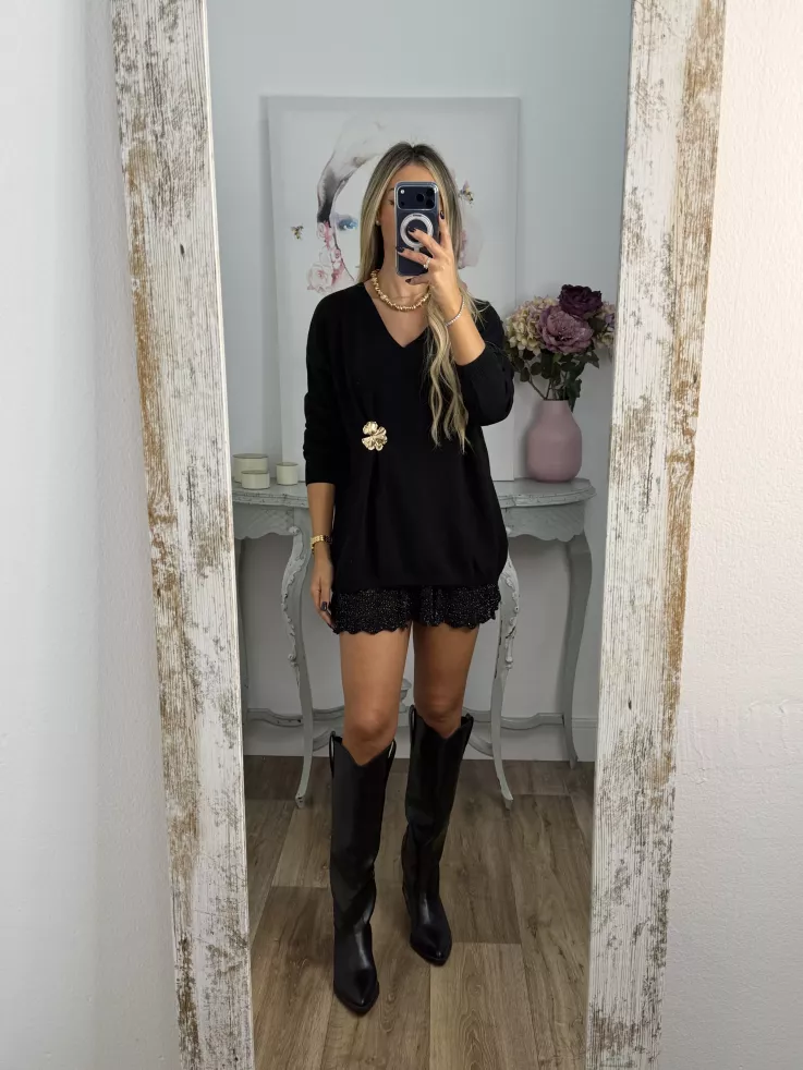 Jersey broche dorado negro