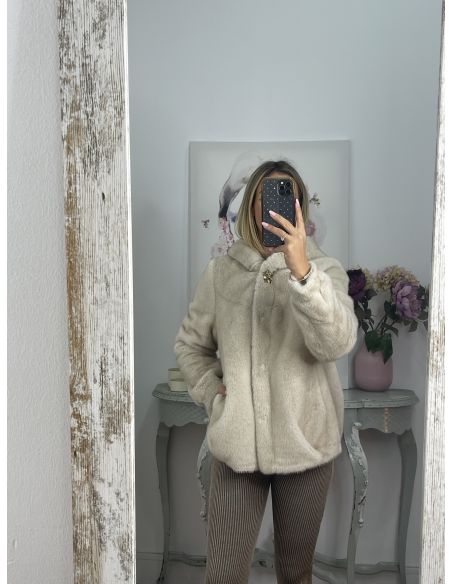 Abrigo beige de pelo con capucha