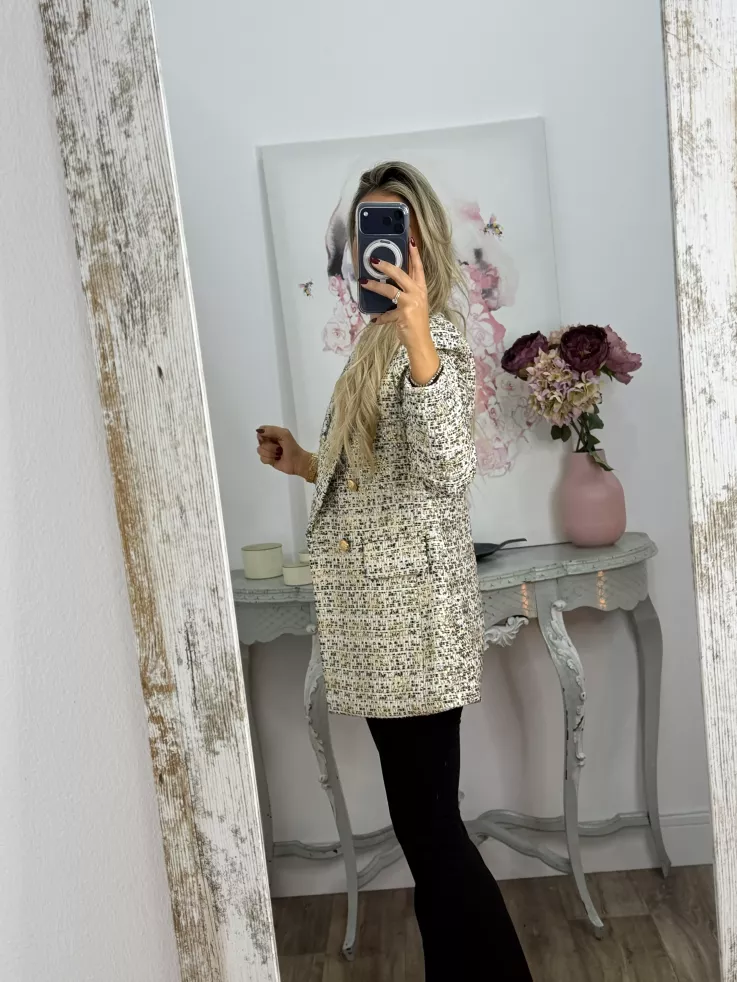 Chaqueta con lentejuelas doradas y negra