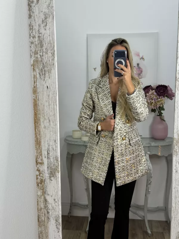 Chaqueta con lentejuelas doradas y negra