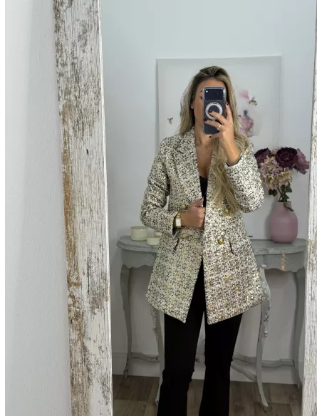 Chaqueta con lentejuelas doradas y negra