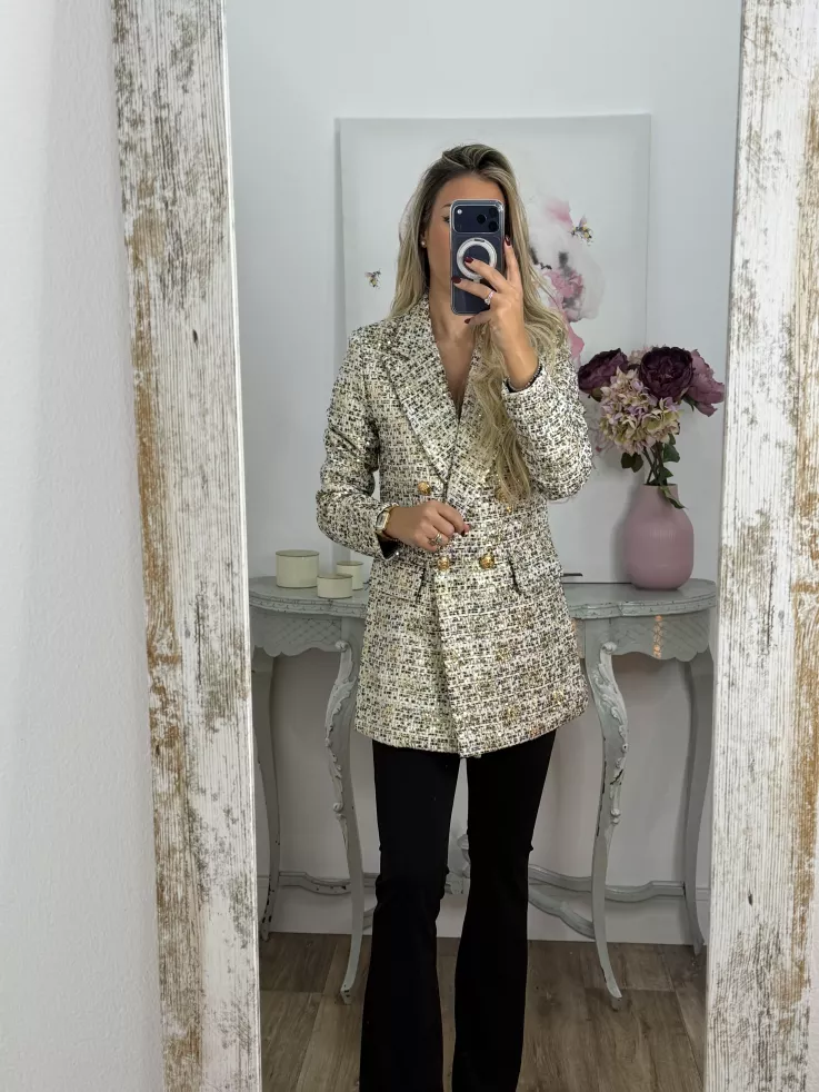 Chaqueta con lentejuelas doradas y negra