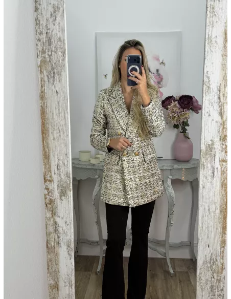 Chaqueta con lentejuelas doradas y negra