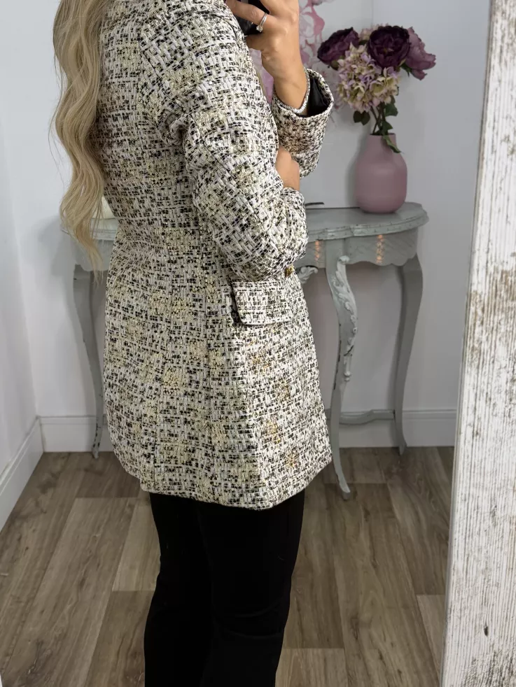 Chaqueta con lentejuelas doradas y negra