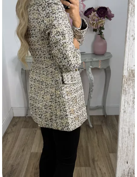 Chaqueta con lentejuelas doradas y negra