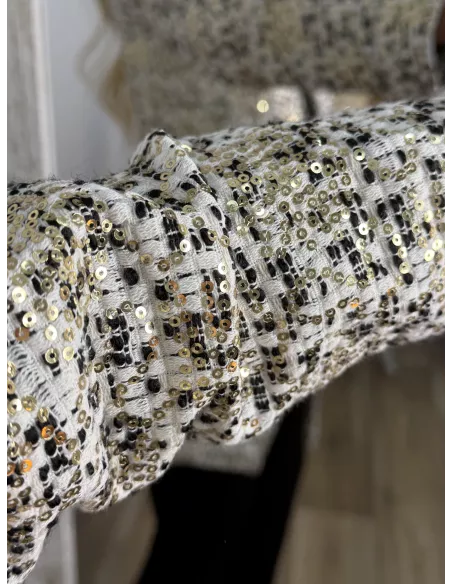 Chaqueta con lentejuelas doradas y negra