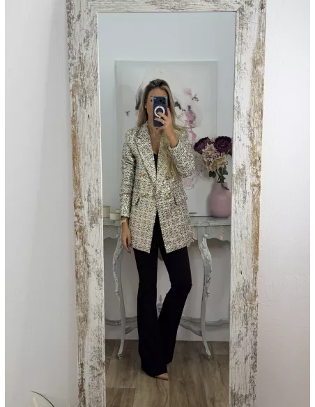 Chaqueta con lentejuelas doradas y negra