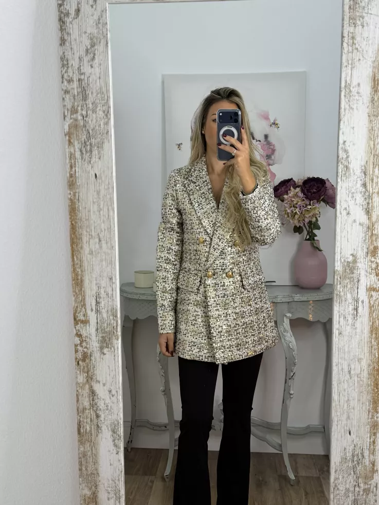 Chaqueta con lentejuelas doradas y negra