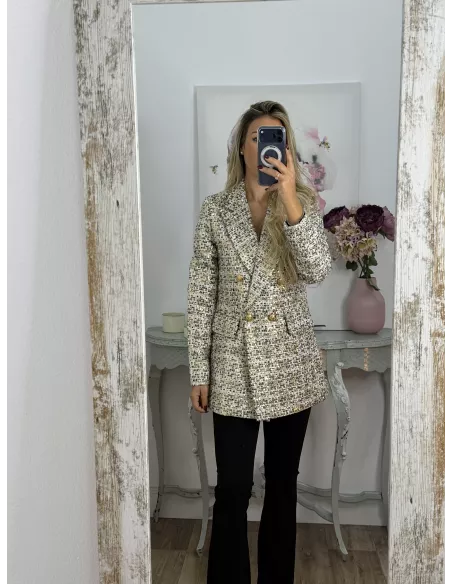 Chaqueta con lentejuelas doradas y negra