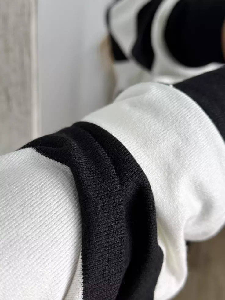 Jersey tipo polo rayas negro y blanca