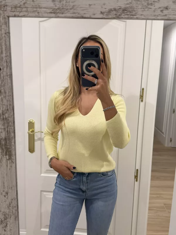 Jersey amarillo estrella en la espalda