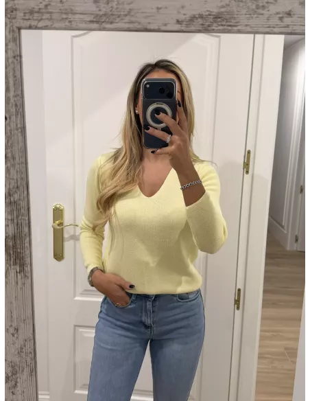 Jersey amarillo estrella en la espalda