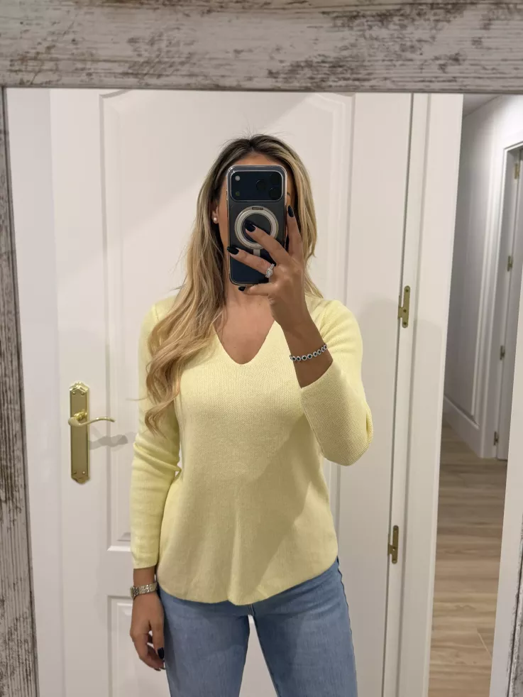 Jersey amarillo estrella en la espalda