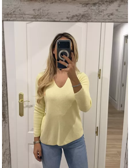 Jersey amarillo estrella en la espalda