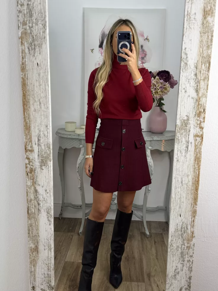 Falda de punto con botones burdeos