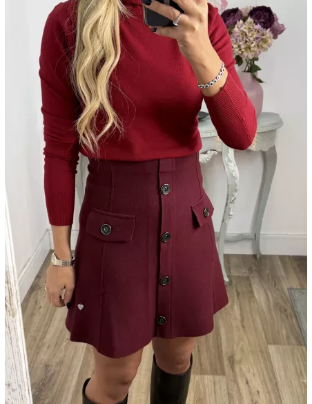 Falda de punto con botones burdeos