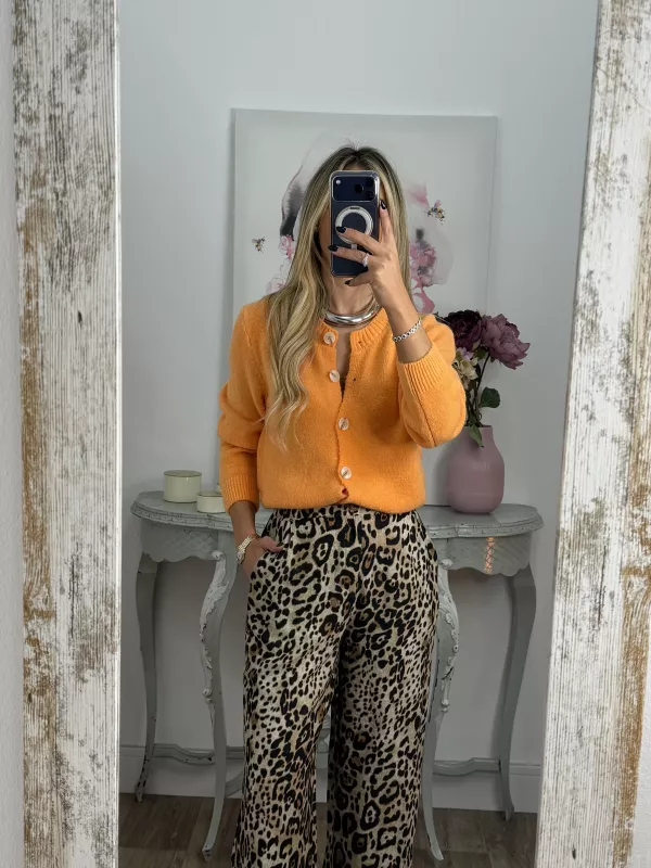 Rebeca de punto naranja