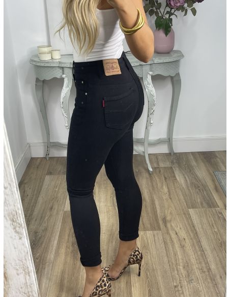 Jeans negro etiqueta roja
