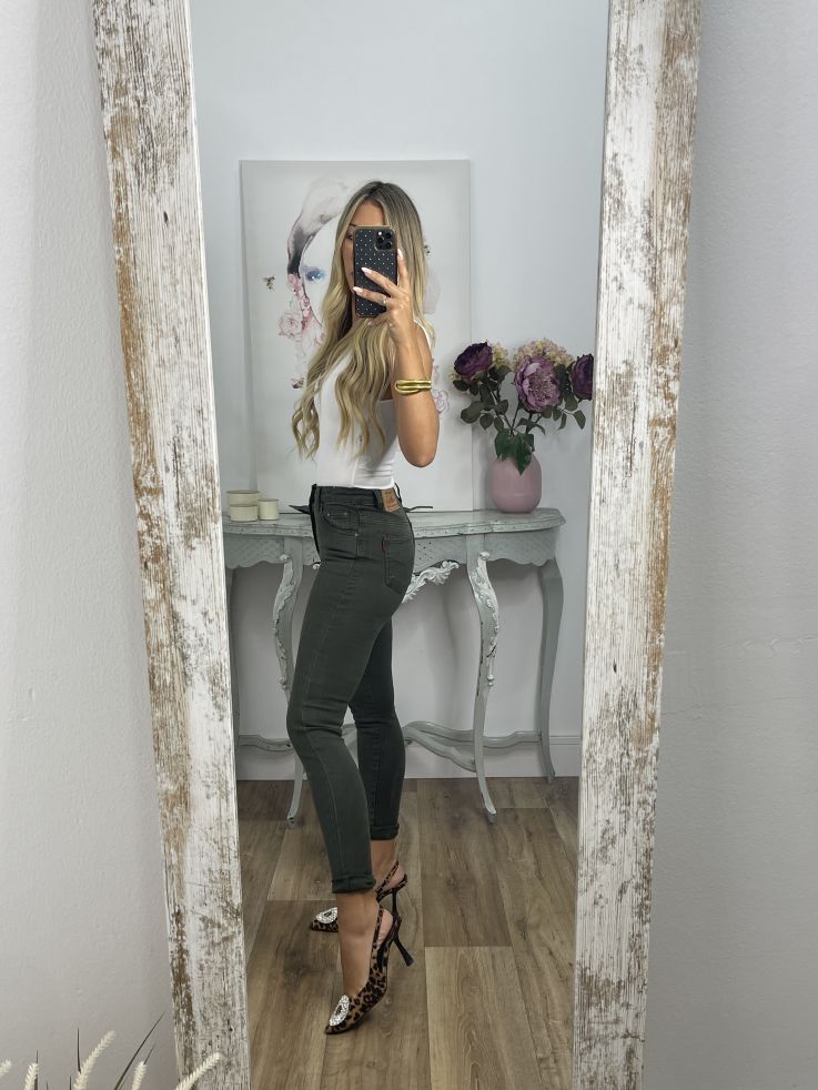 Jeans verde etiqueta roja