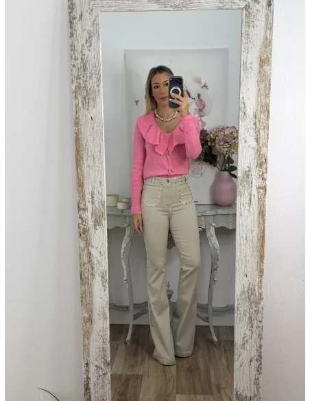 Jeans beige tachuelas y estrella rosa