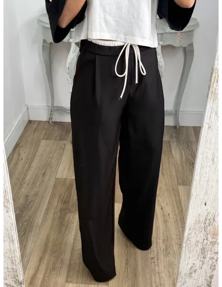 Pantalón negro con cinturilla blanca