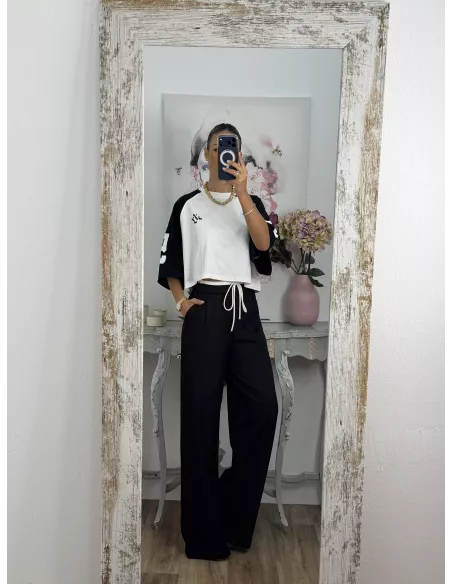 Pantalón negro con cinturilla blanca