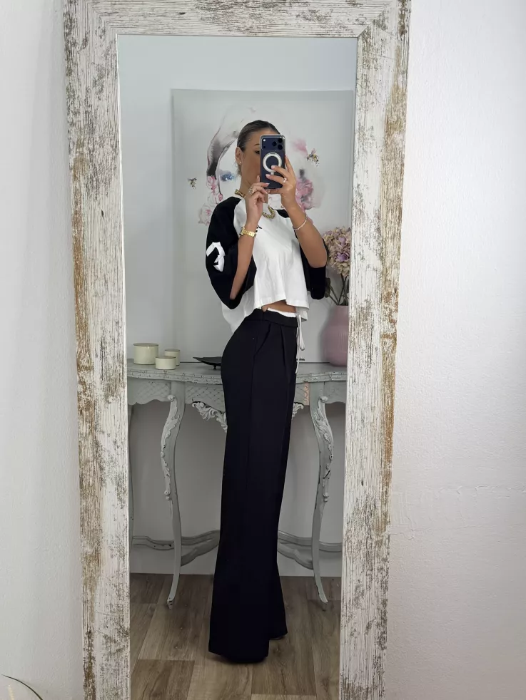 Pantalón negro con cinturilla blanca