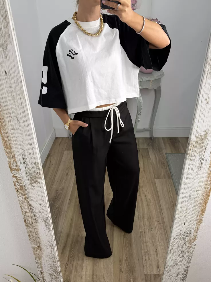 Pantalón negro con cinturilla blanca