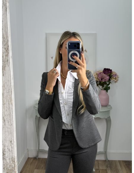 Traje chaqueta y pantalón pitillo gris