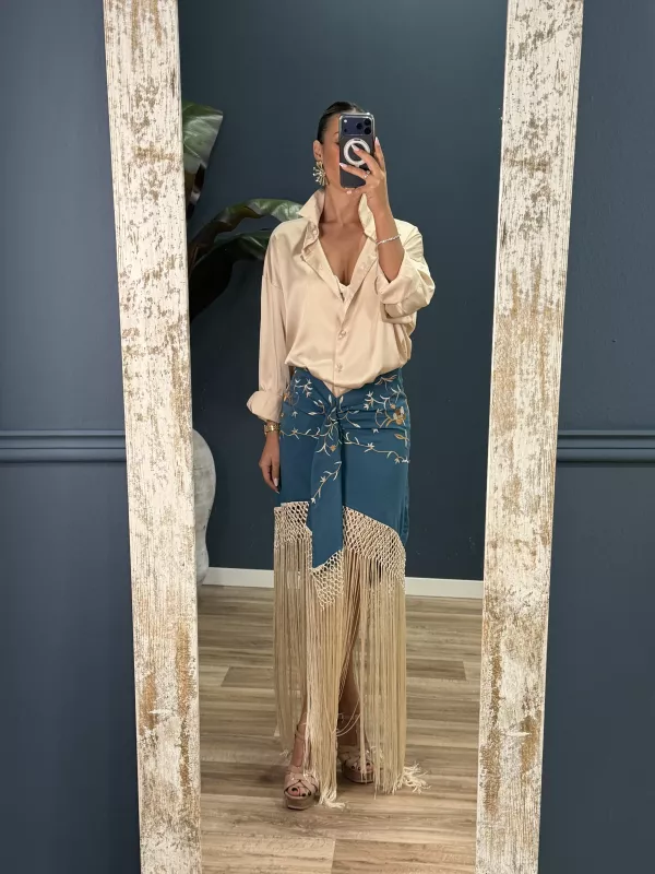 Falda azul borda con flecos